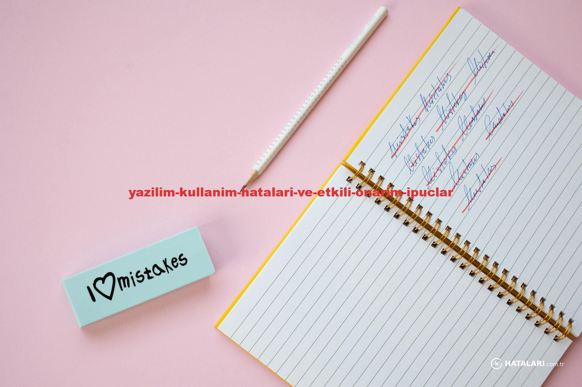 Flat lay of a spiral notebook and eraser on a pastel pink background with crossed out words.